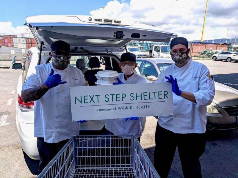 Hawaii Baptist Academy chefs (left to right) BJ Delima, Placer Dayang and Jensen Manuel deliver meals to Next Step Shelter in Honolulu. 