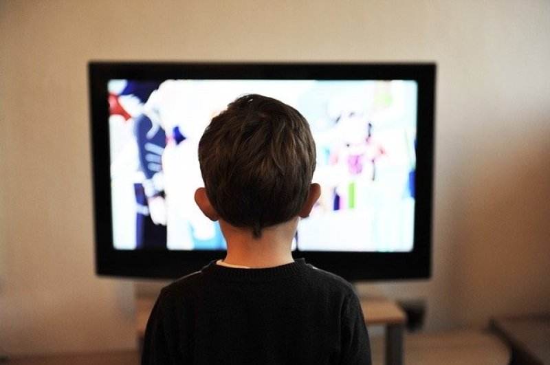 Child watching shows on TV