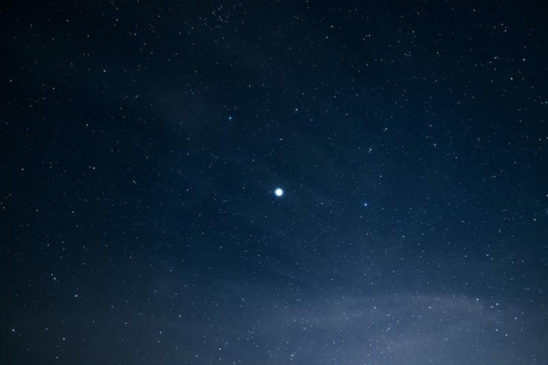 Lone star in night sky
