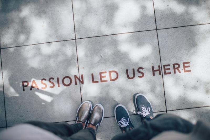 "Passion led us here" written on floor