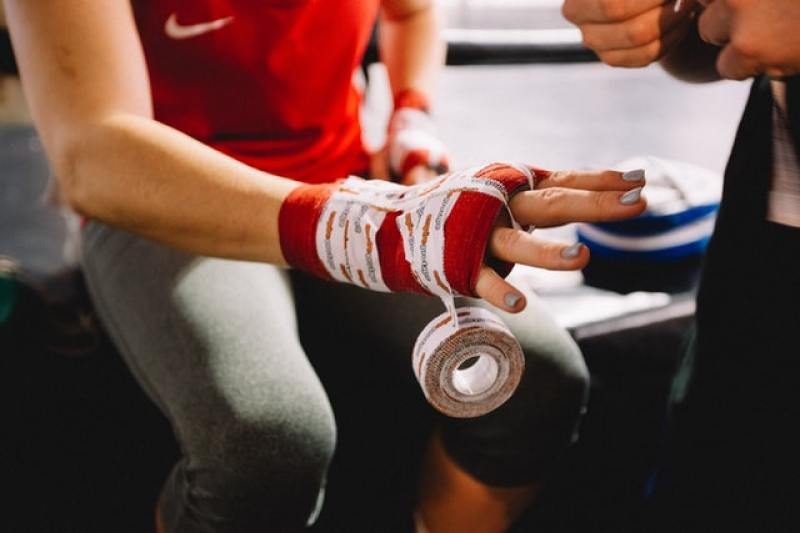 prepping for a round of mixed martial arts