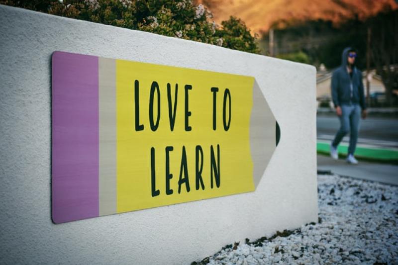 "Love to Learn" signage outside school