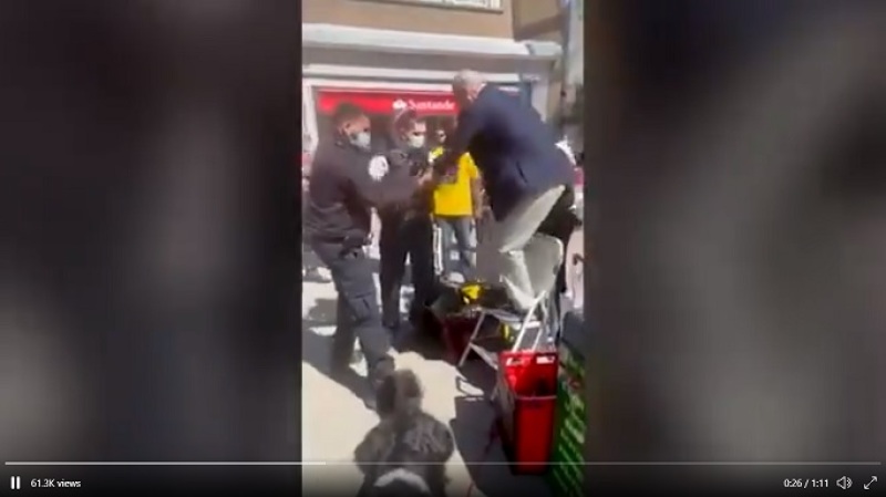 Pastor John Sherwood being arrested