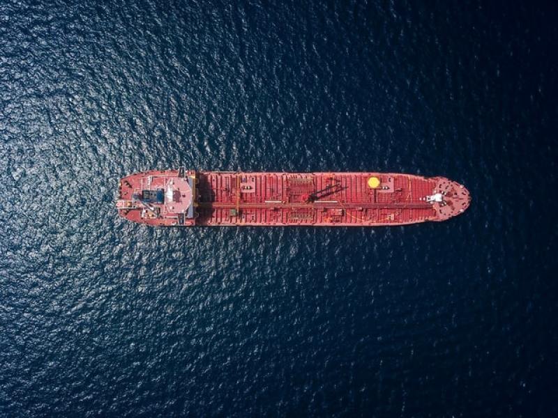 red tanker / ship in the middle of the sea