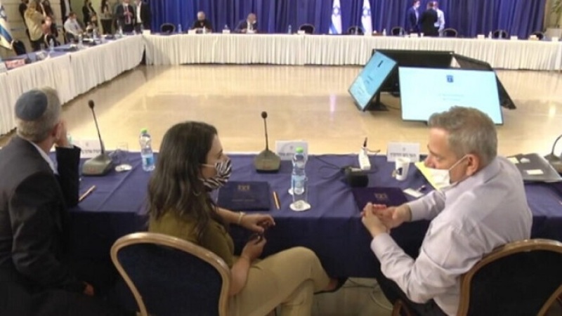 Israeli Health Minister Nitzan Horowitz speaking with Interior Minister Ayelet Shaked