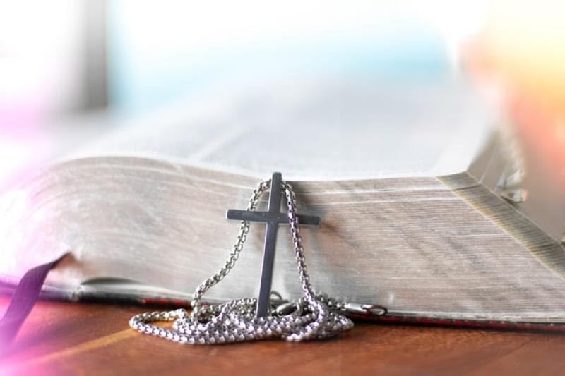 cross pendant and Bible