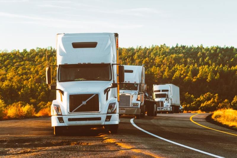 haul trucks following one after another