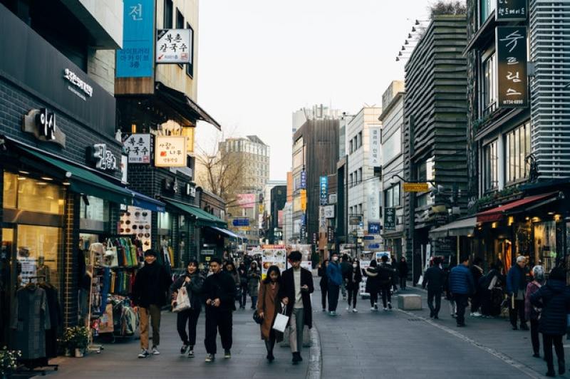 people walking on a street in South Korea