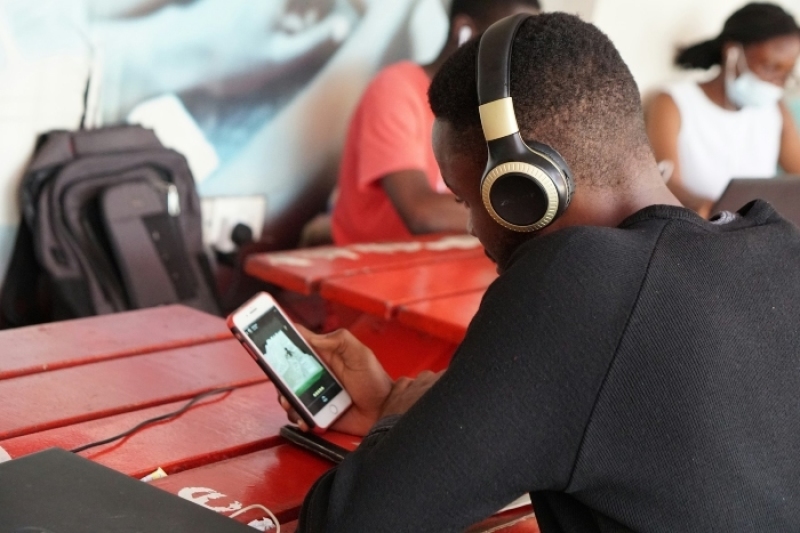 A man looking at his cellphone